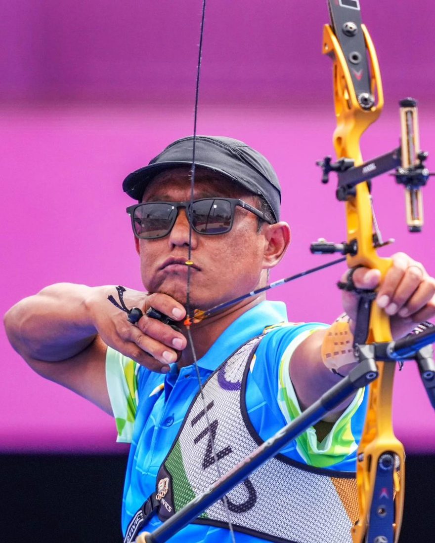 Tarundeep Rai at full draw during international competition